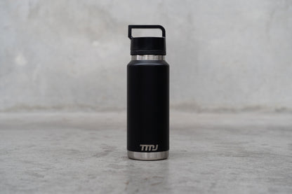 Black stainless steel TMJ Apparel 1 litre drink bottle.